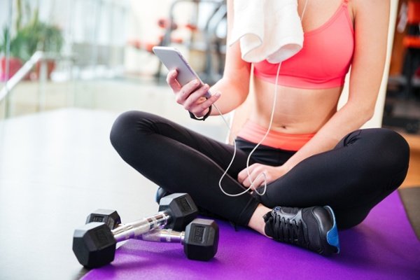 Gym- Woman on phone